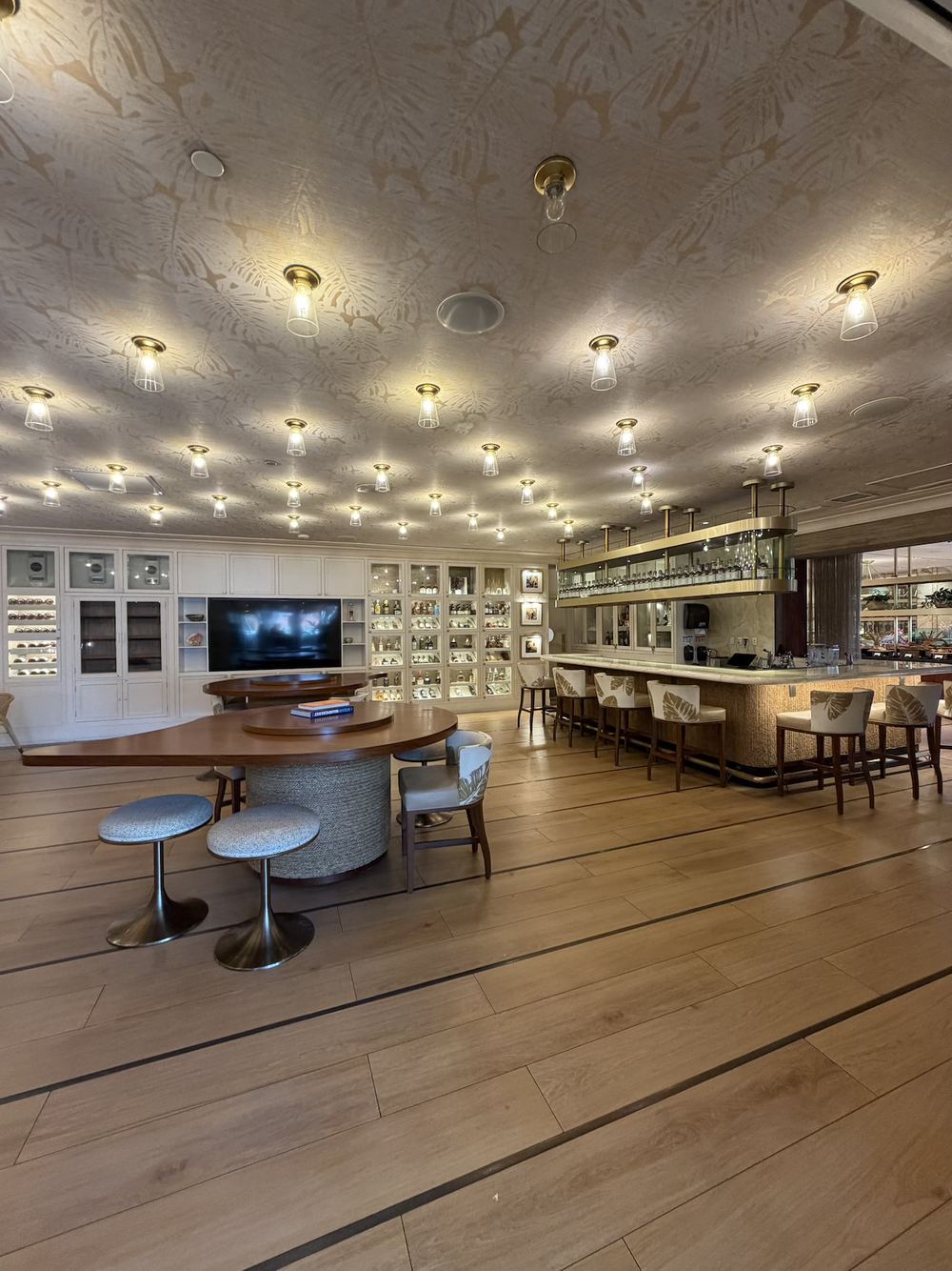 A light, modern hotel lounge and meeting space